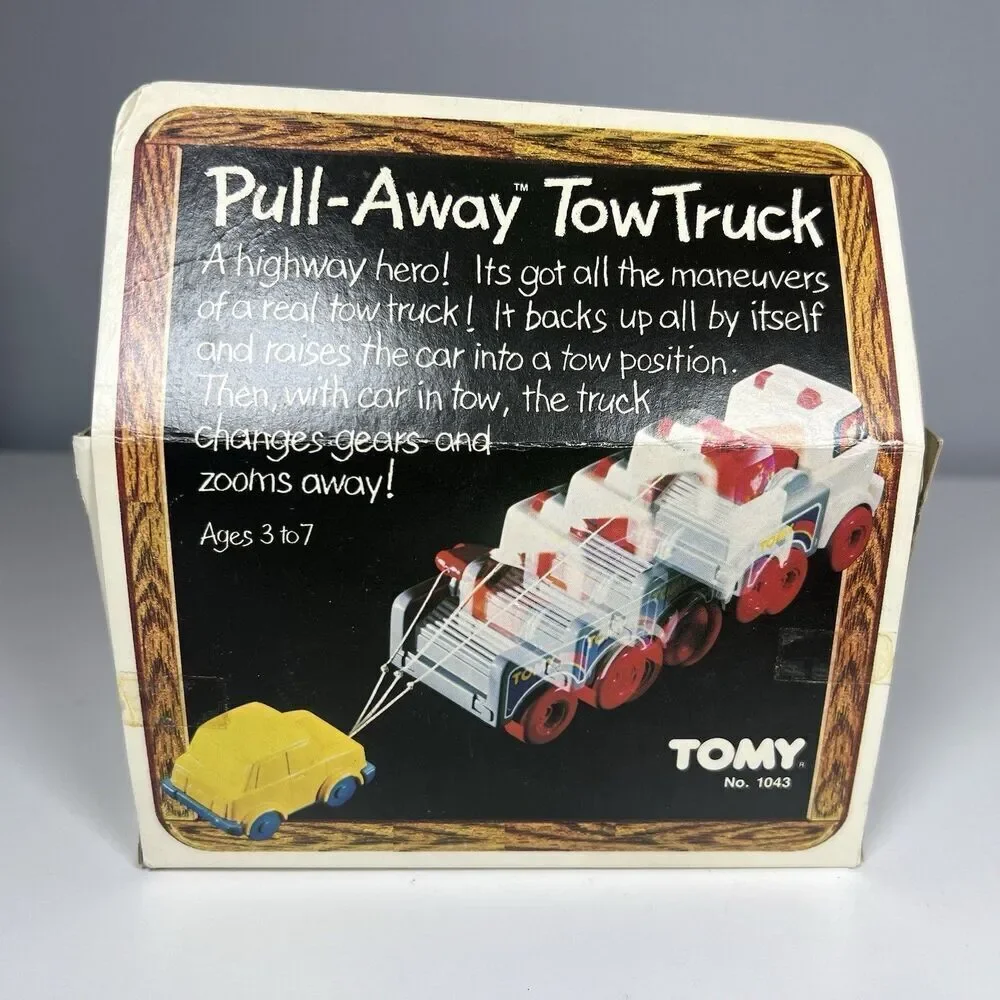 Tomy Pull-Away Toy Tow Truck Vintage 1984 No. 1043 Complete With Box & Booklet